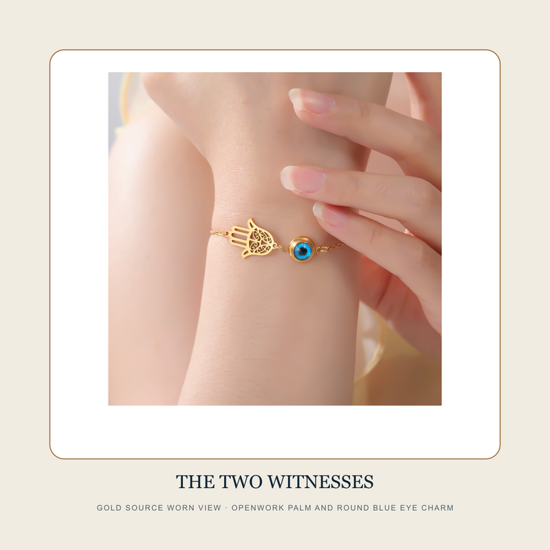 Gold worn source view of The Two Witnesses chain bracelet with openwork palm and round blue eye charm