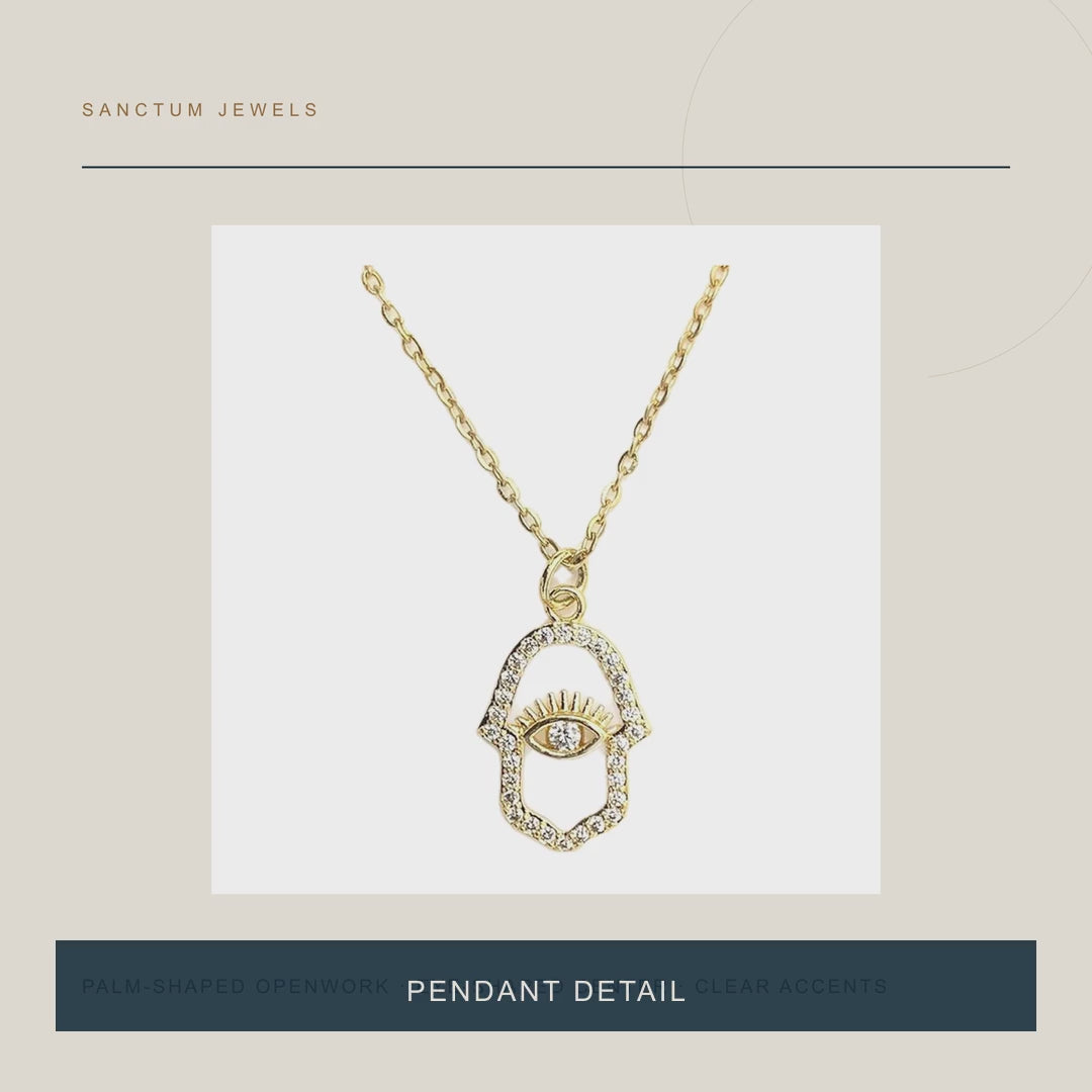 The Watching Palm — Gold-Tone Palm-and-Eye Pendant Necklace — 15-second product story film