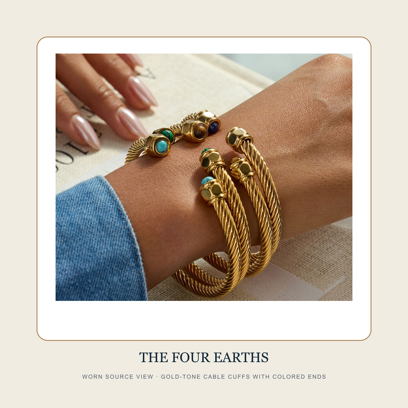 Worn source view of The Four Earths gold-tone twisted cable open cuffs with colored cabochon-style ends