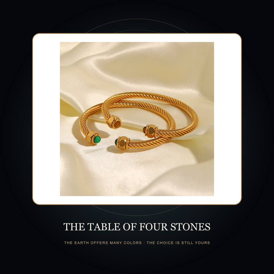The Four Earths cuff in the fictional Table of Four Stones Night Archive story scene