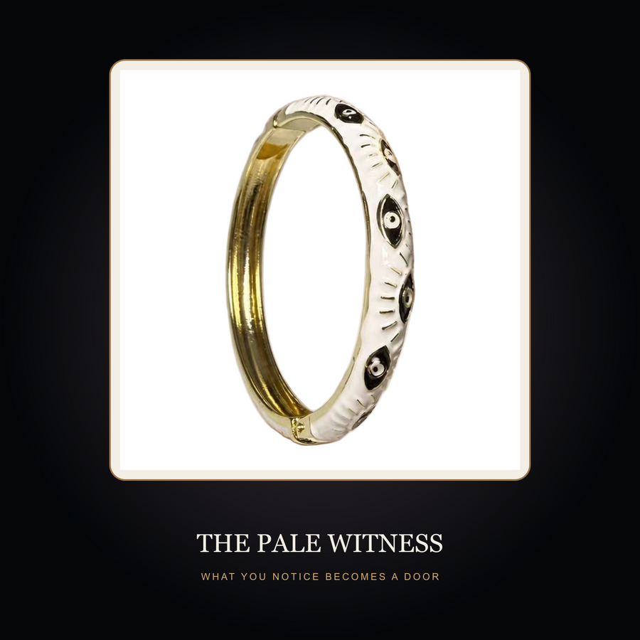 White-Black Enamel Eye bangle in the fictional Pale Witness story scene