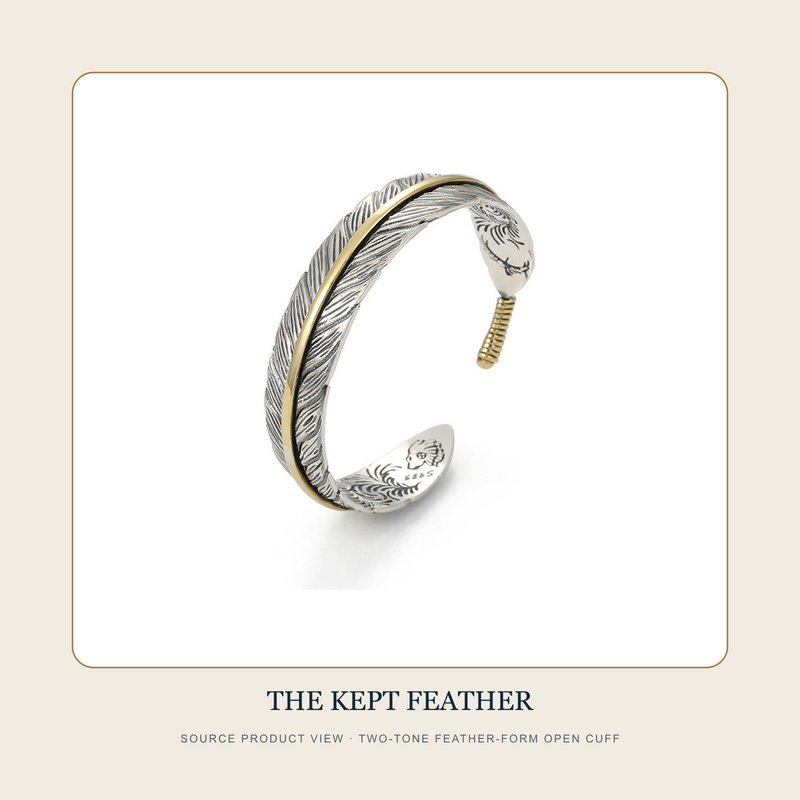 Source product view of The Kept Feather two-tone engraved feather-form open cuff