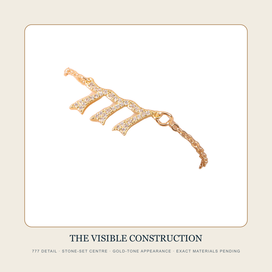 Close detail of the photographed 777 repeating-number bracelet centre and chain