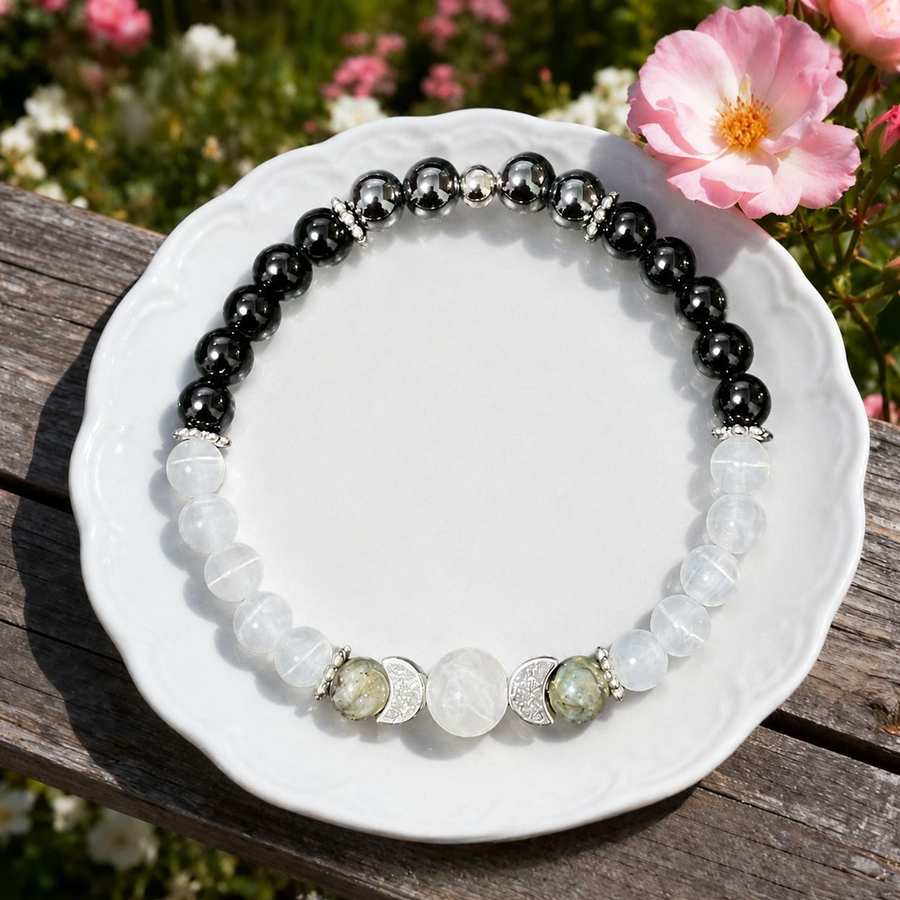 Full view of The Two Tides bracelet showing divided bead sections and crescent spacers