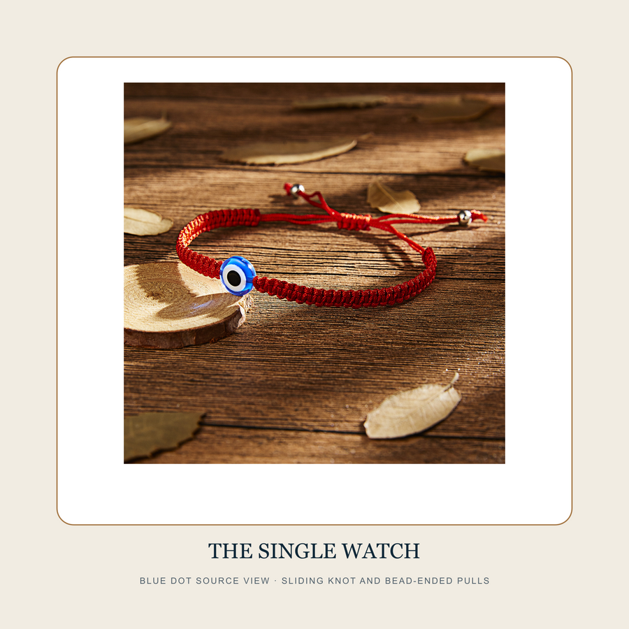 Blue Dot source view of The Five Red Knots red-cord bracelet with sliding knotted closure