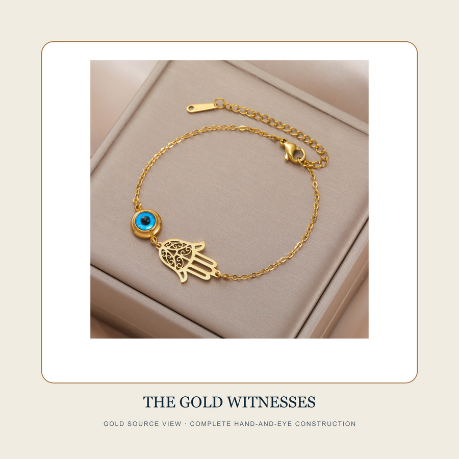Gold source view of the complete hand-and-eye construction of The Two Witnesses bracelet