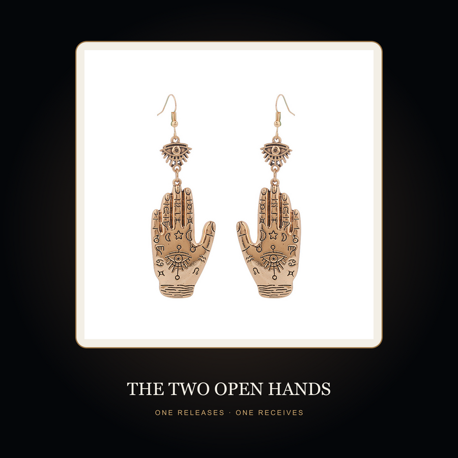 The Twin Wards earrings in the fictional Two Open Hands story scene