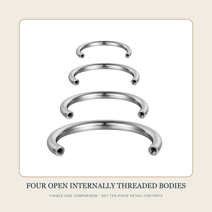 Four open steel-tone internally threaded circular-barbell bodies shown as a source size comparison