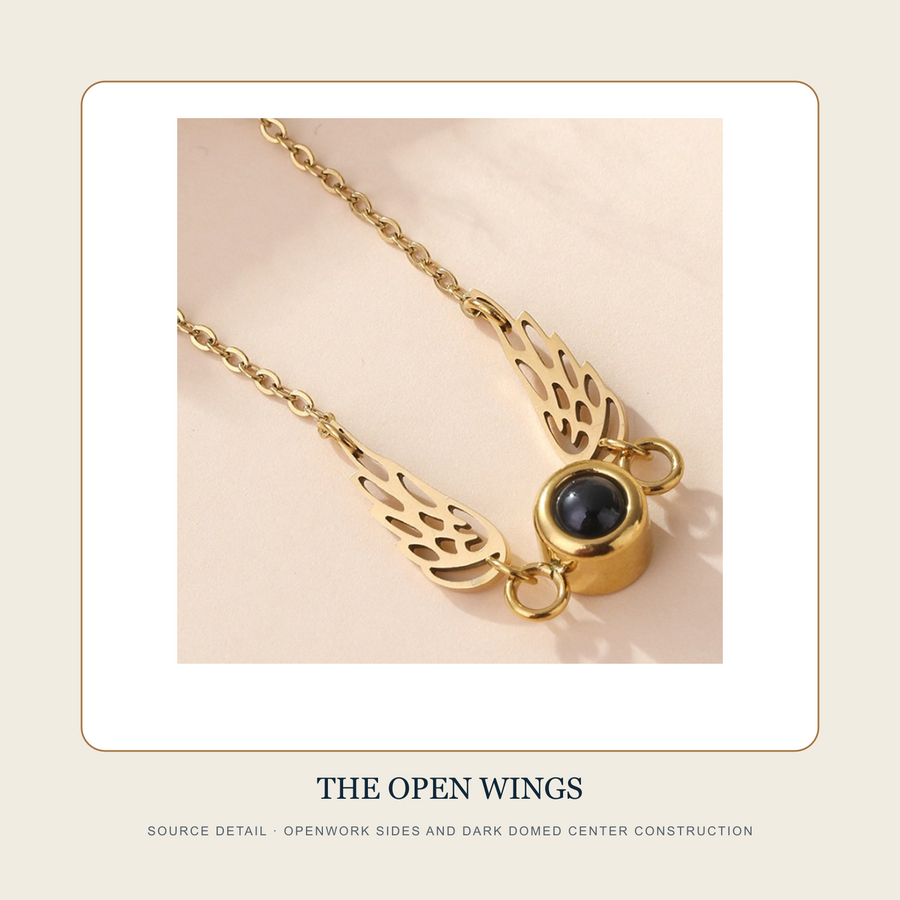 Source detail of The Untranslated Question openwork wing-form sides and dark domed center