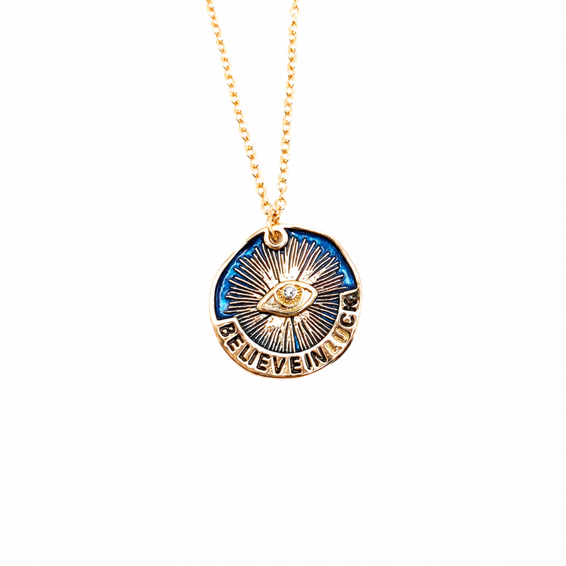 Front view of The Sleepless Witness blue eye medallion necklace on a gold-tone chain