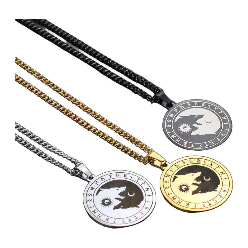 The Wolfbound twin wolf medallion necklace in black, steel, and gold tones