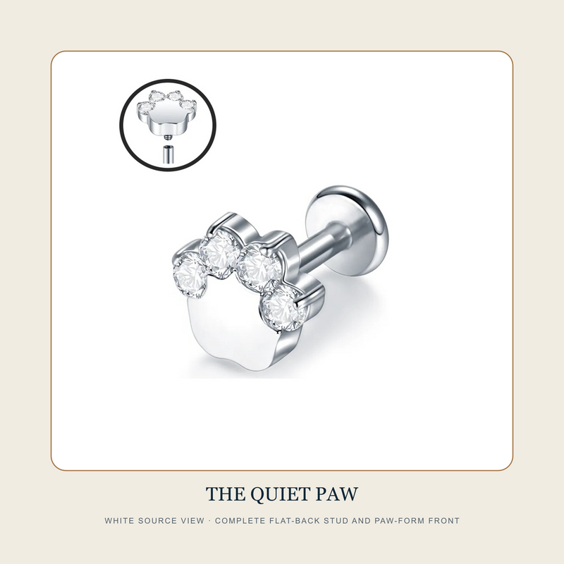 White source view of The Quiet Paw complete flat-back stud with paw-form clear-accent front