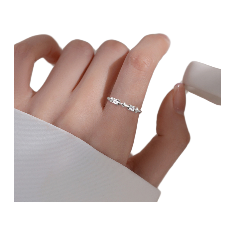 The Starfall slim silver-tone open ring worn on the hand