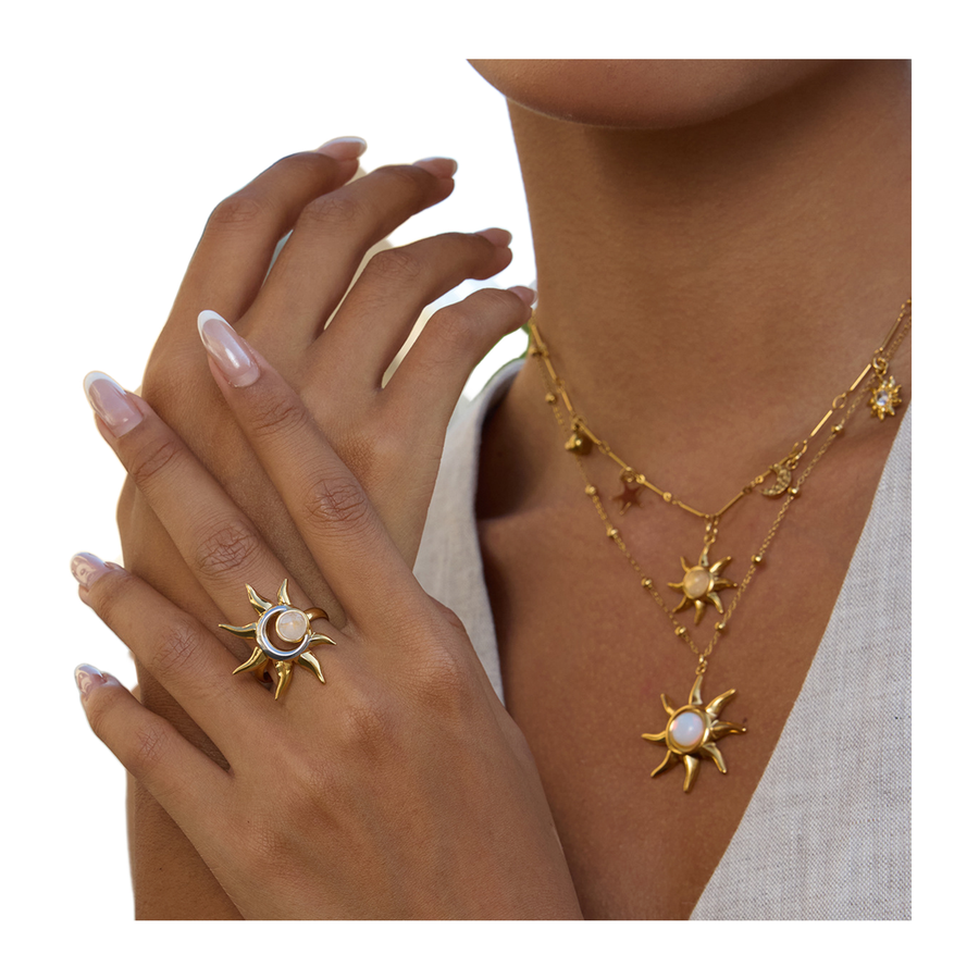 The Daystar ring styled with coordinating celestial jewelry