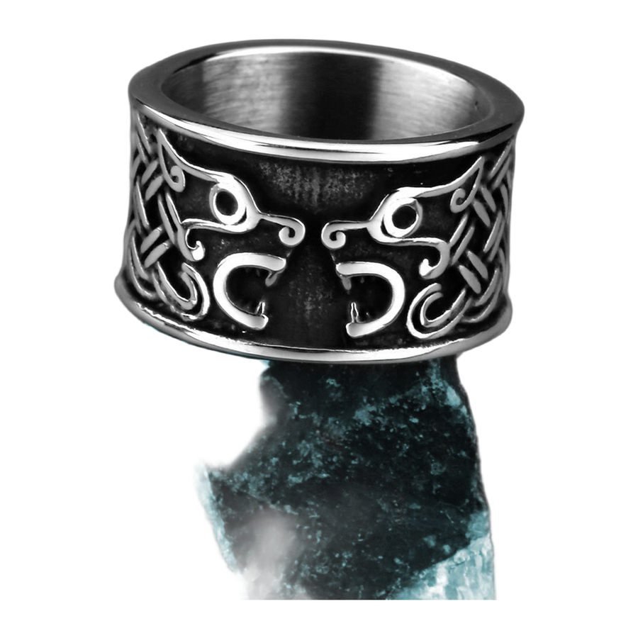 Angled view of The Twin Wolves blackened and polished steel-style ring