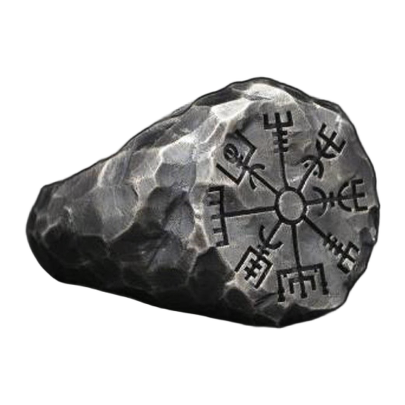 Angled view of The Snow Compass hammered compass-style signet ring