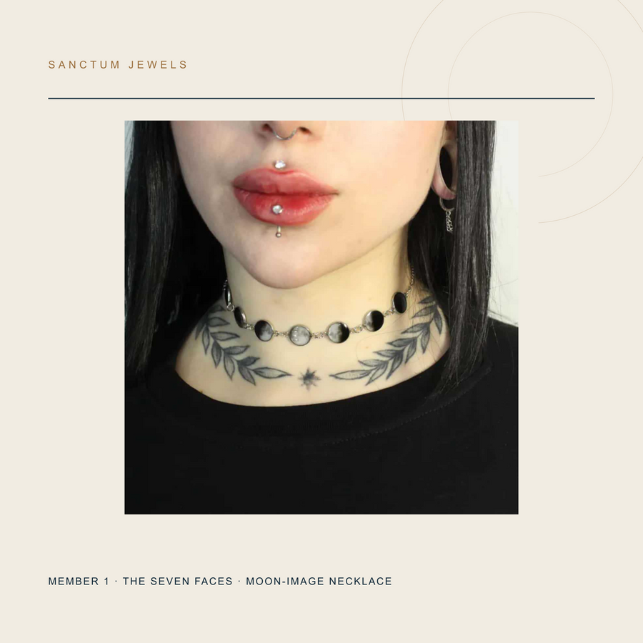 The Seven Faces seven-panel moon-image necklace included in The Calendar Without Dates set