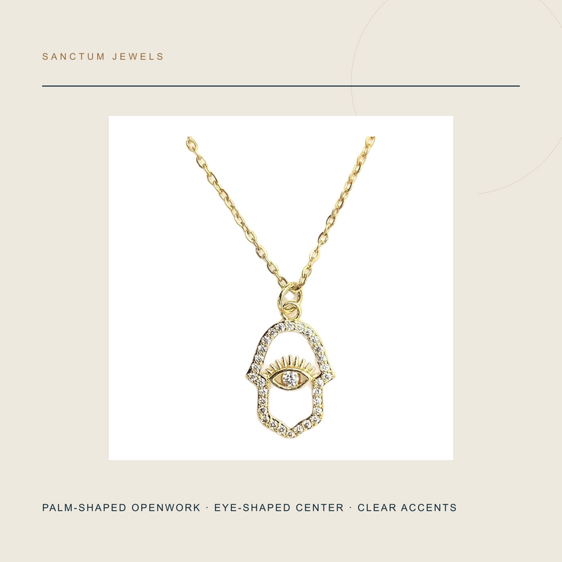 The Watching Palm — Gold-Tone Palm-and-Eye Pendant Necklace — pendant detail